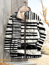 Women's Black and White Abstract Puffer Jacket in Casual Style