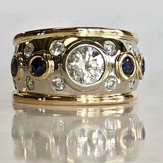 Vintage ring with gold and zirconia inlay